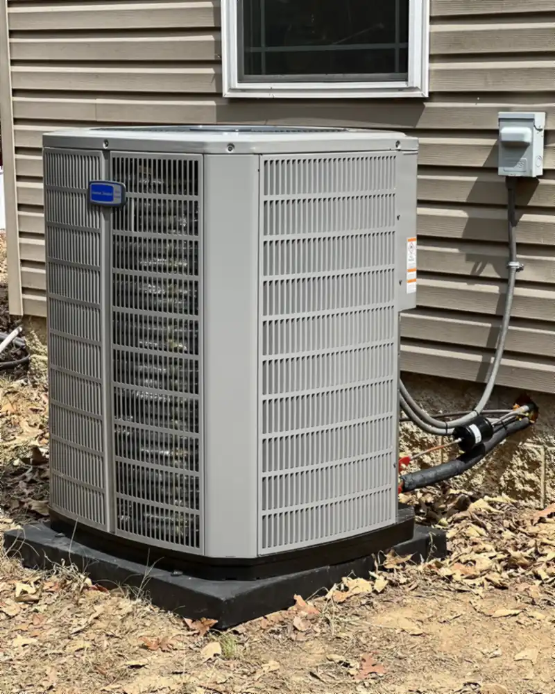 American Standard outdoor unit on a new pad, installed by Gambill’s Heating & Air